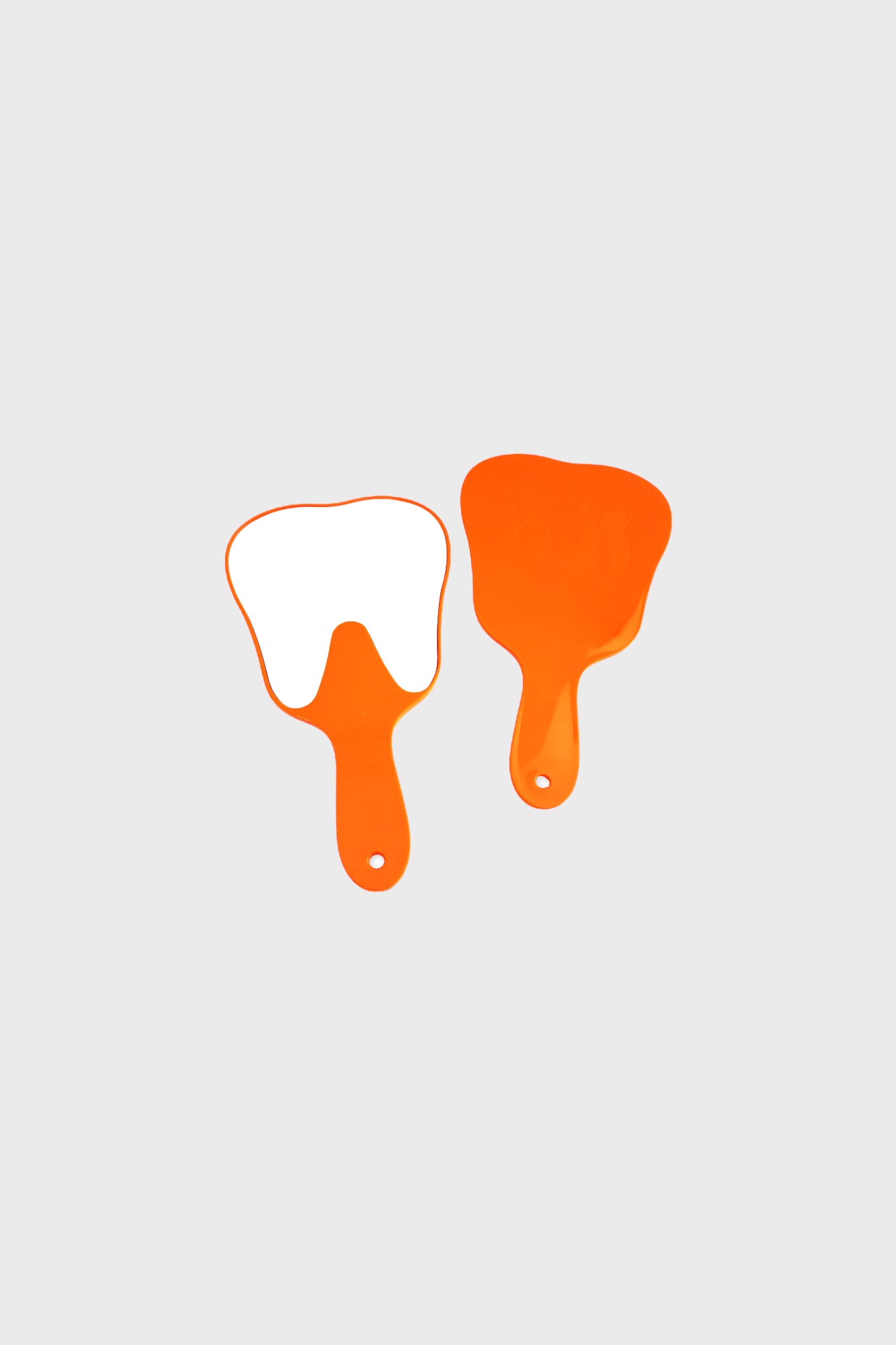 Tooth shaped mirror in different colors