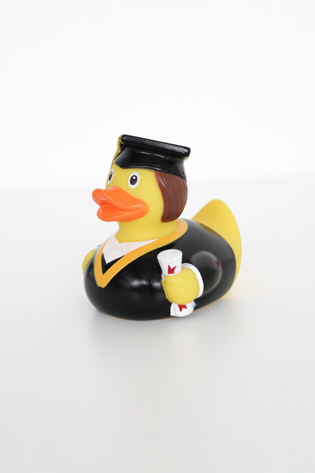 Graduation plastic duck toy