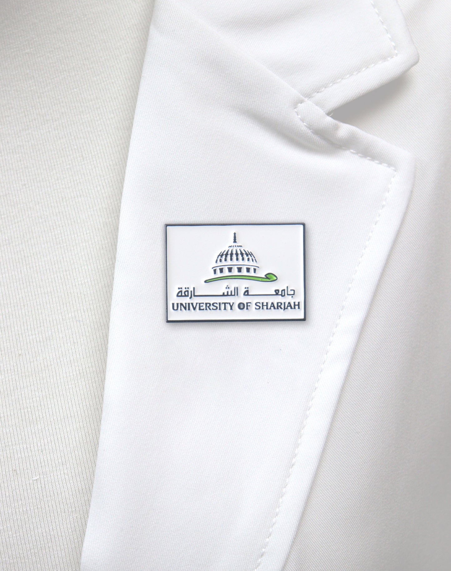 University of Sharjah Pin- White
