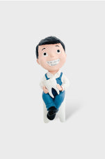 files-boy-with-tooth-figurine-jpg