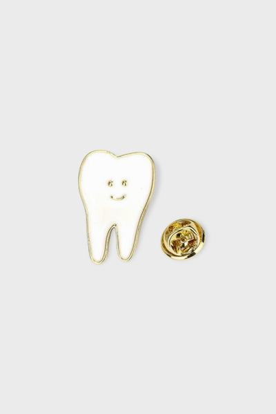 دبوس الأسنان الذهبي