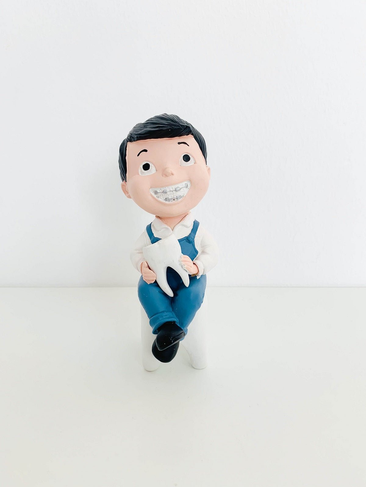 products-boy_with_tooth_figurine-917790-jpg